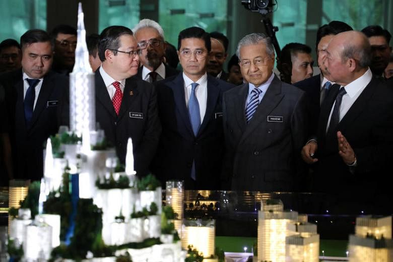 Menghidupkan kembali proyek Bandar Malaysia untuk memasukkan stasiun Kereta Api Kecepatan Tinggi, kata PM Mahathir